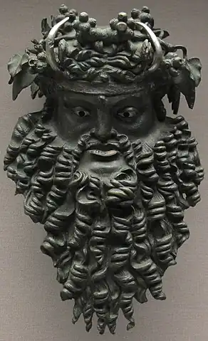 Máscara de Dioniso en bronce, entre el 200 a. C. al 100 d. C.